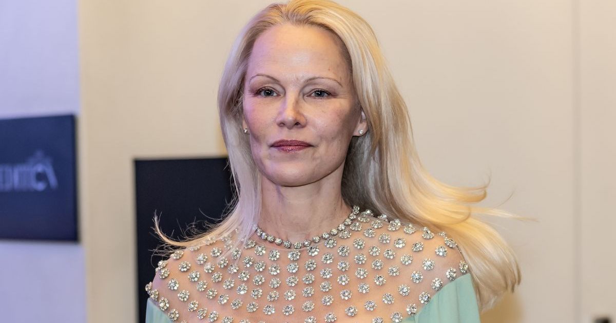 Only Pamela Anderson Could’ve Made This Sheer Pastel Gown Work